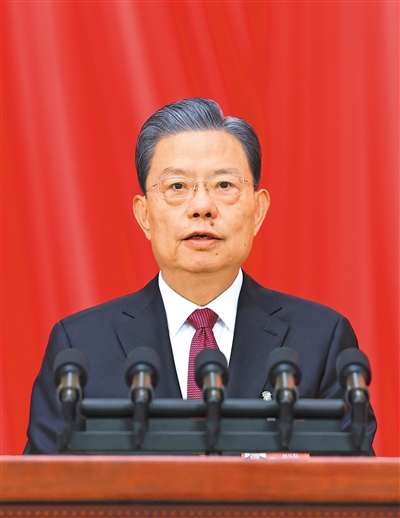 3月8日，十四屆全國人大二次會(huì)議在北京人民大會(huì)堂舉行第二次全體會(huì)議。受全國人大常委會(huì)委托，趙樂際委員長向大會(huì)報(bào)告全國人大常委會(huì)工作。 　　新華社記者 王 曄攝
